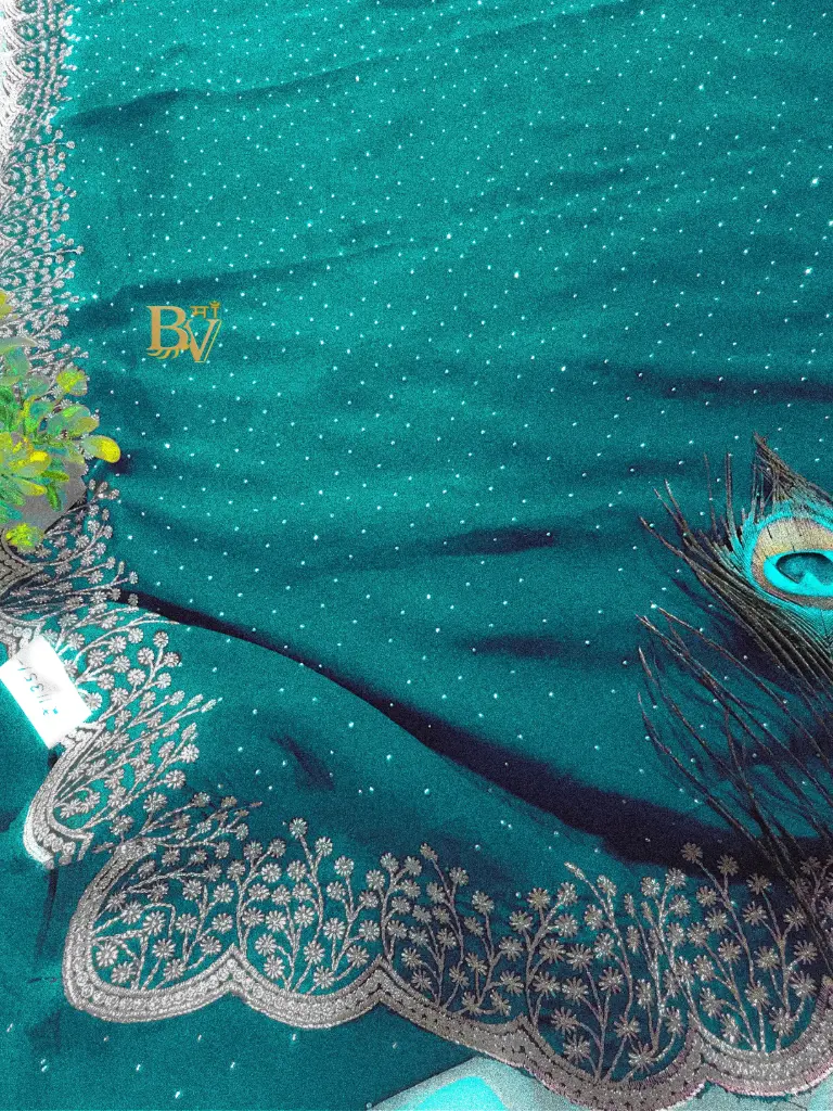 Green saree with Silver Embroidery Border
